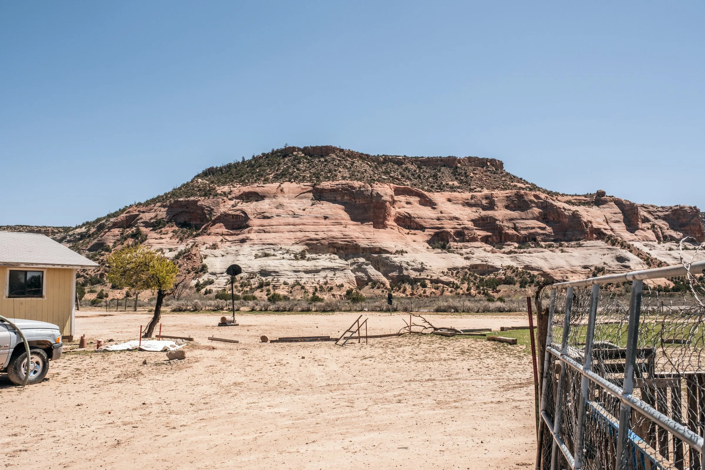 Hauling Life | Navajo Nation — Unified Metadata Paragraphs

Wayne Wilson and Joann Whiting collect water in Gallup, New Mexico at a community water source. The containers are filled, prepared, and loaded into their vehicle for transport across the Na