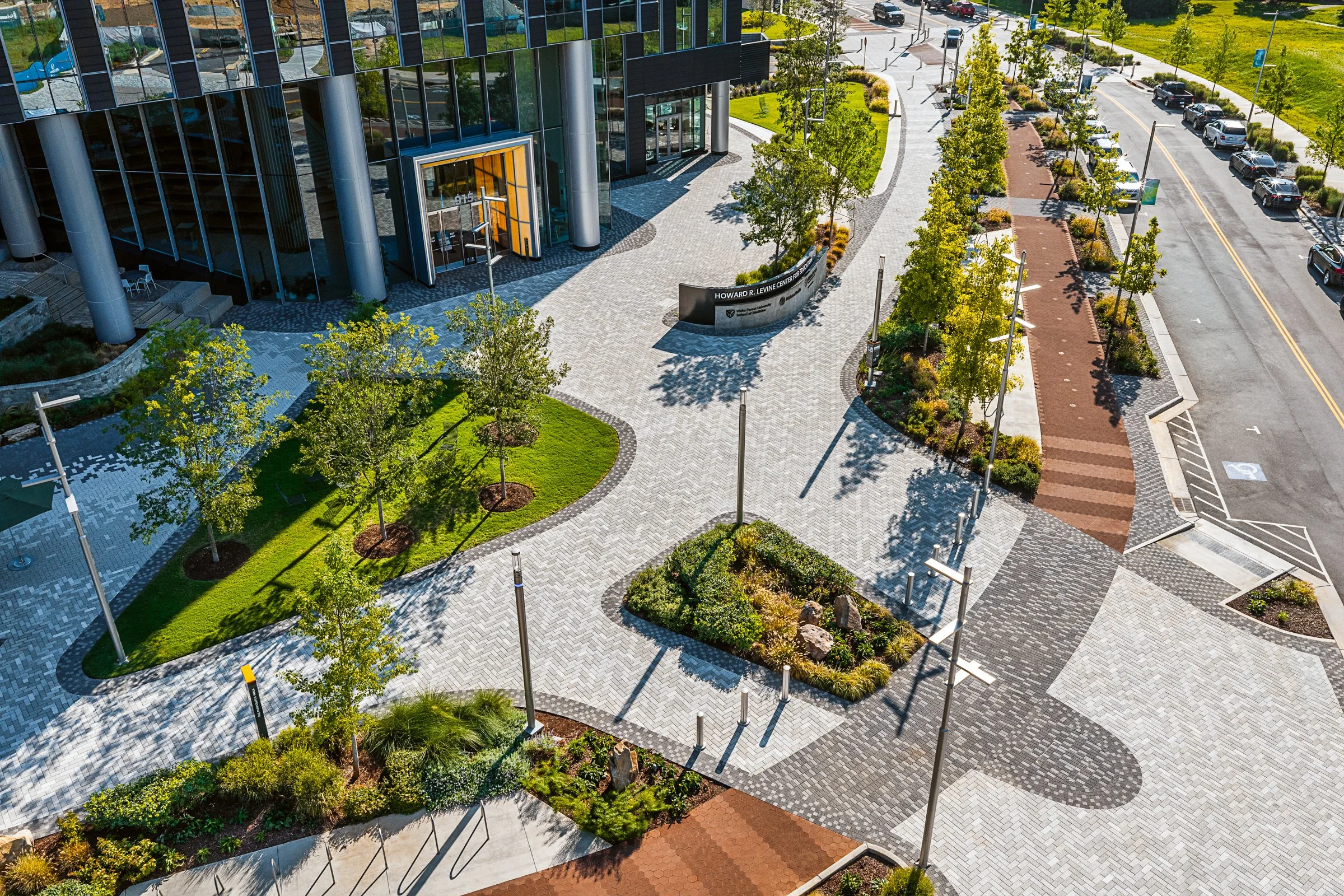 Landscape architecture photography of The Pearl in Charlotte, North Carolina, commissioned by Kimley-Horn and photographed by Paul Lange of Lange Photo Studio. The project features landscaped public spaces, a terraced central plaza, and the Purposefu