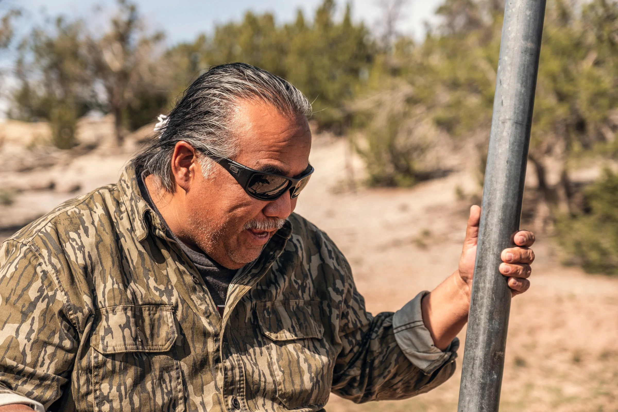 Hauling Life | Navajo Nation — Unified Metadata Paragraphs

Wayne Wilson and Joann Whiting collect water in Gallup, New Mexico at a community water source. The containers are filled, prepared, and loaded into their vehicle for transport across the Na