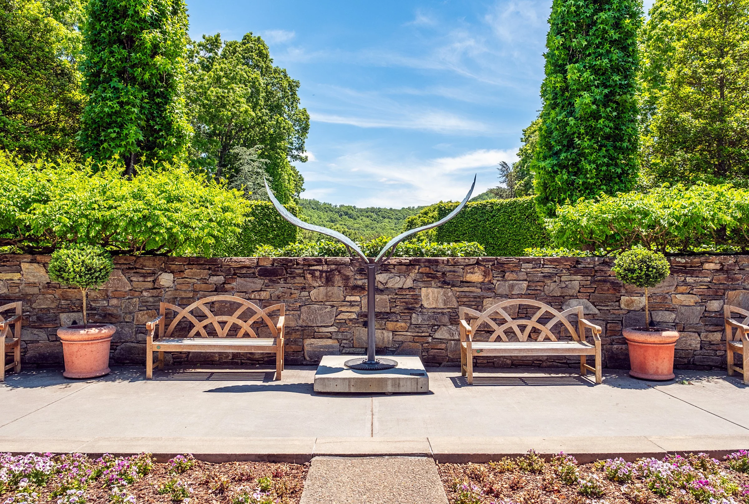 A quiet garden path and bonsai display at the North Carolina Arboretum near Asheville, North Carolina. Photographed by Lange Photo Studio. 
