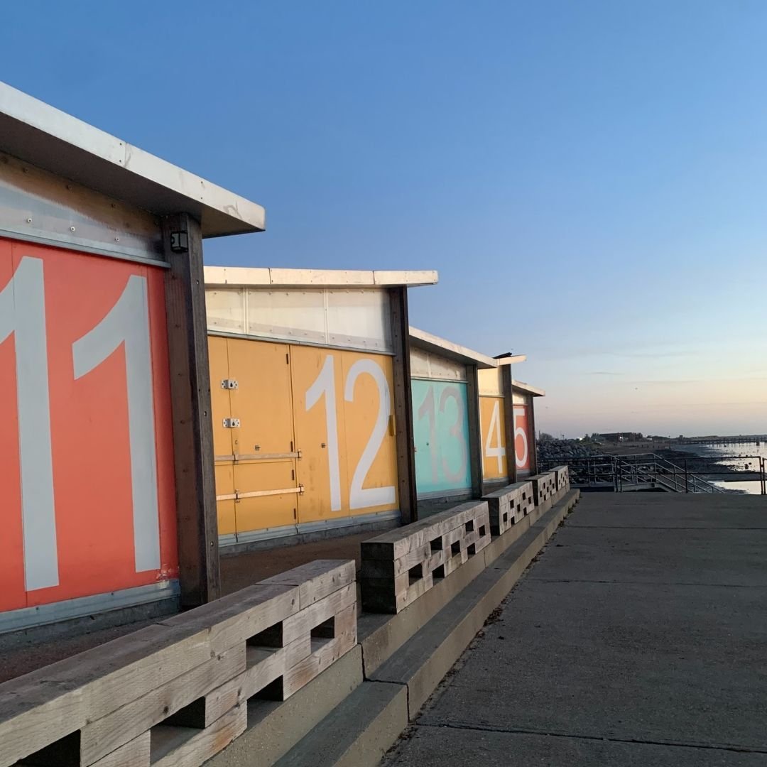Photo of the beautiful beach huts down at East Beach, during Golden Hour sunrise...!