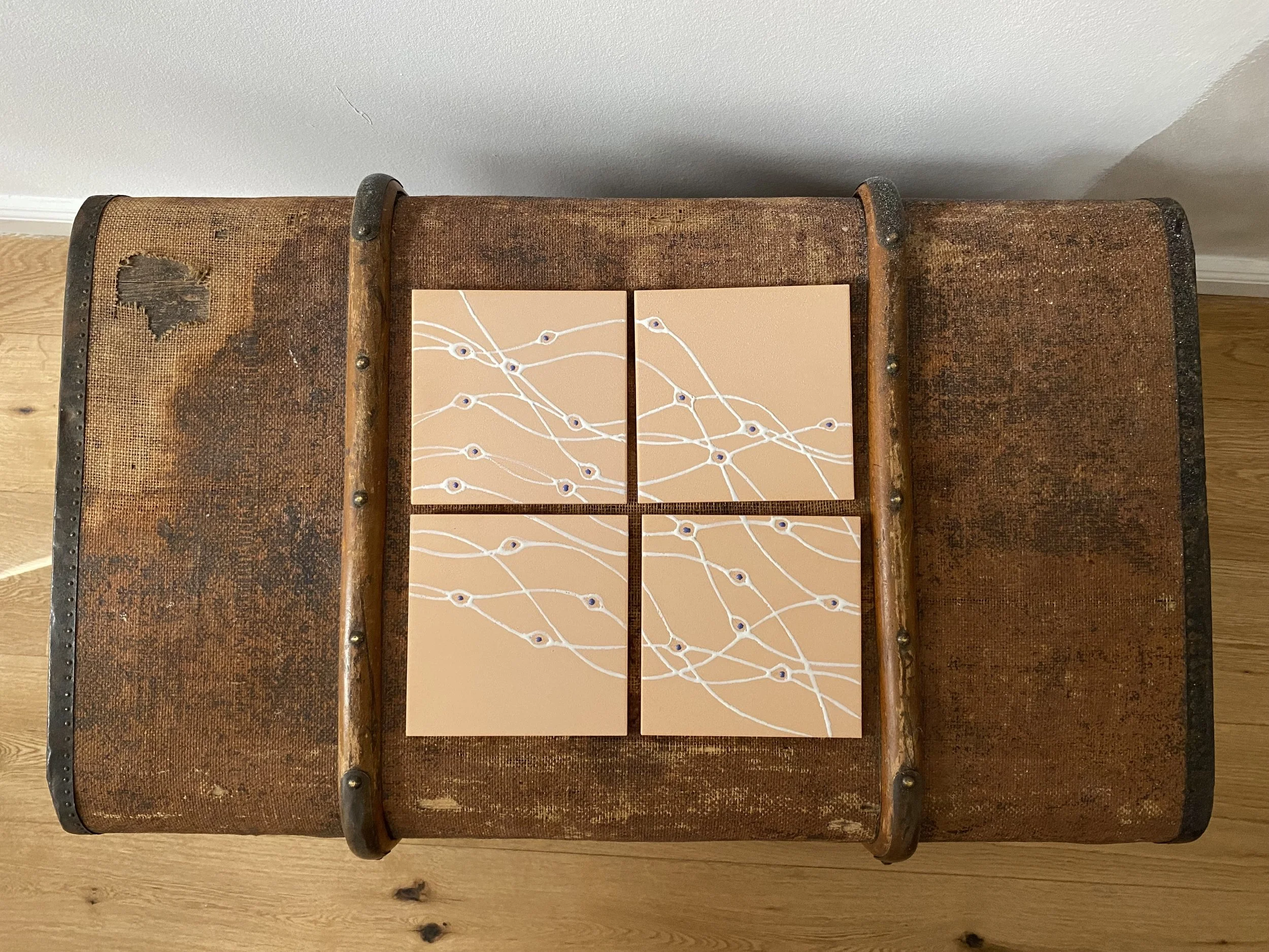 Marta tiles on trunk above full view.jpg