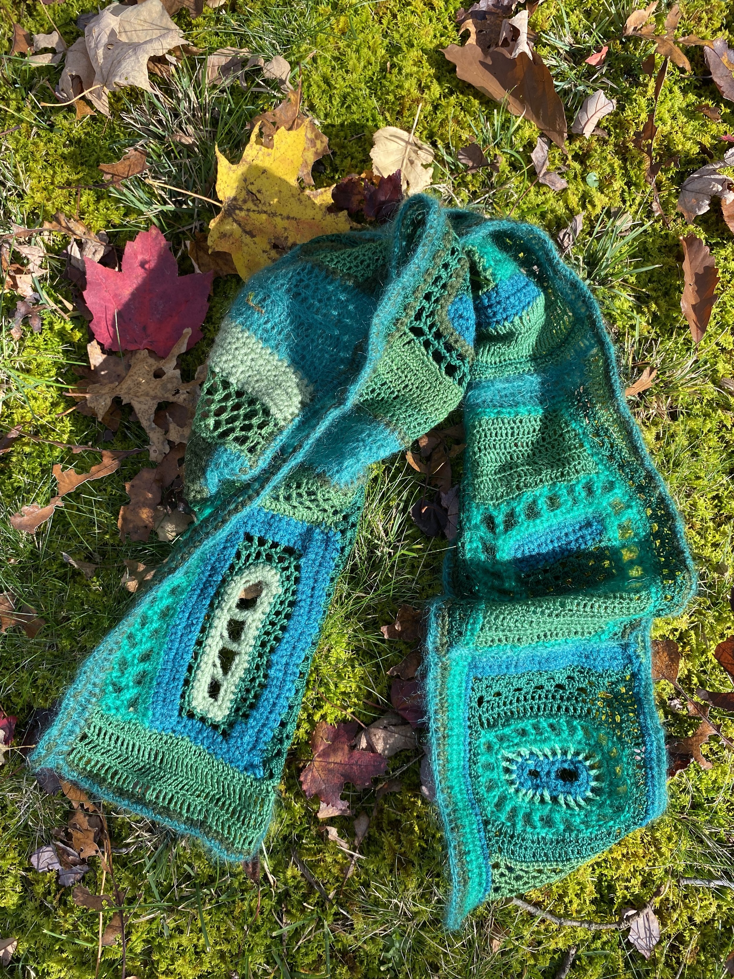 scarf on moss and leaves.jpeg