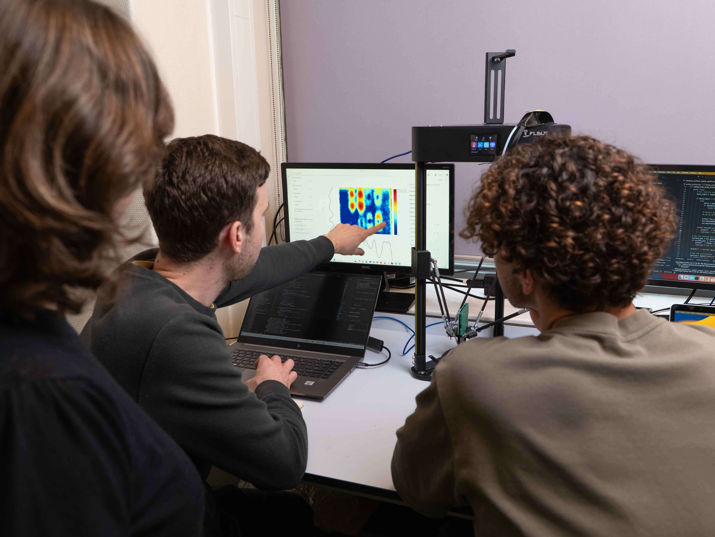 engineers looking at live carbon analysis in the laboratory