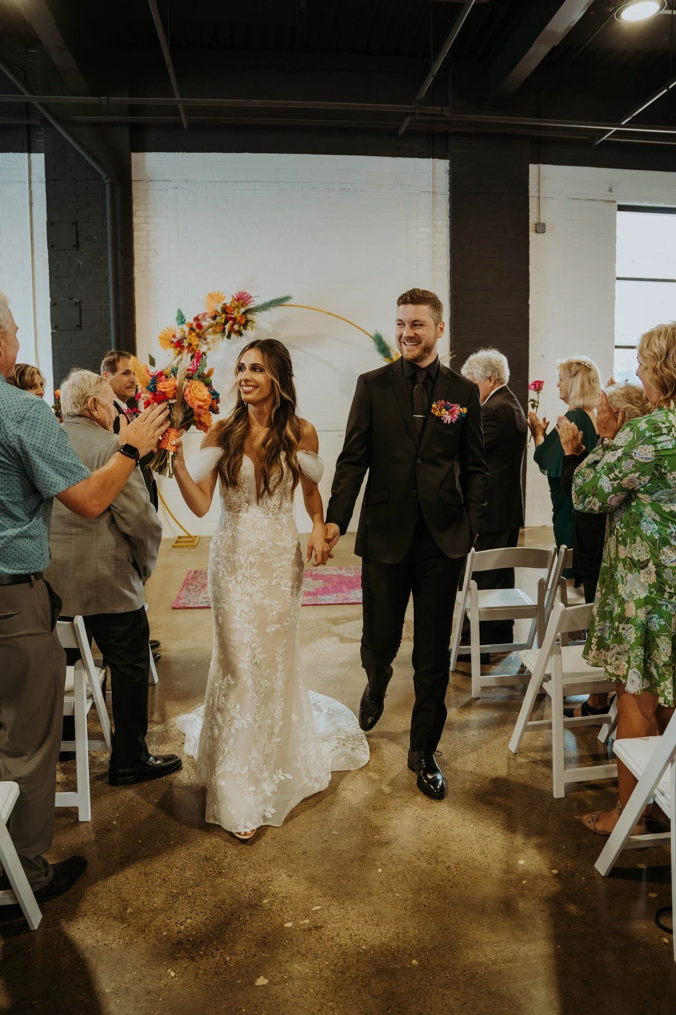 Main Hall - Ceremony Couple walking up aisle.jpg