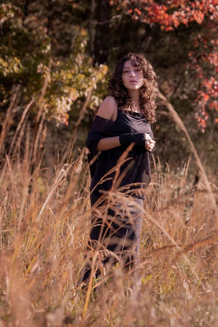 High school senior portrait, young woman in golden hour  