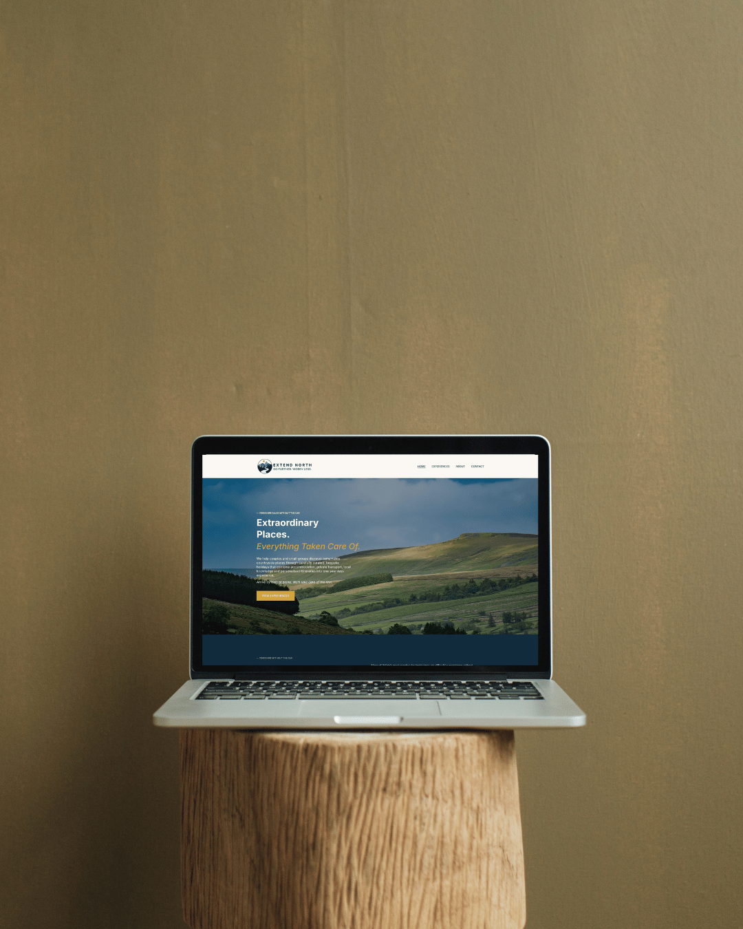 Extend North travel website on laptop