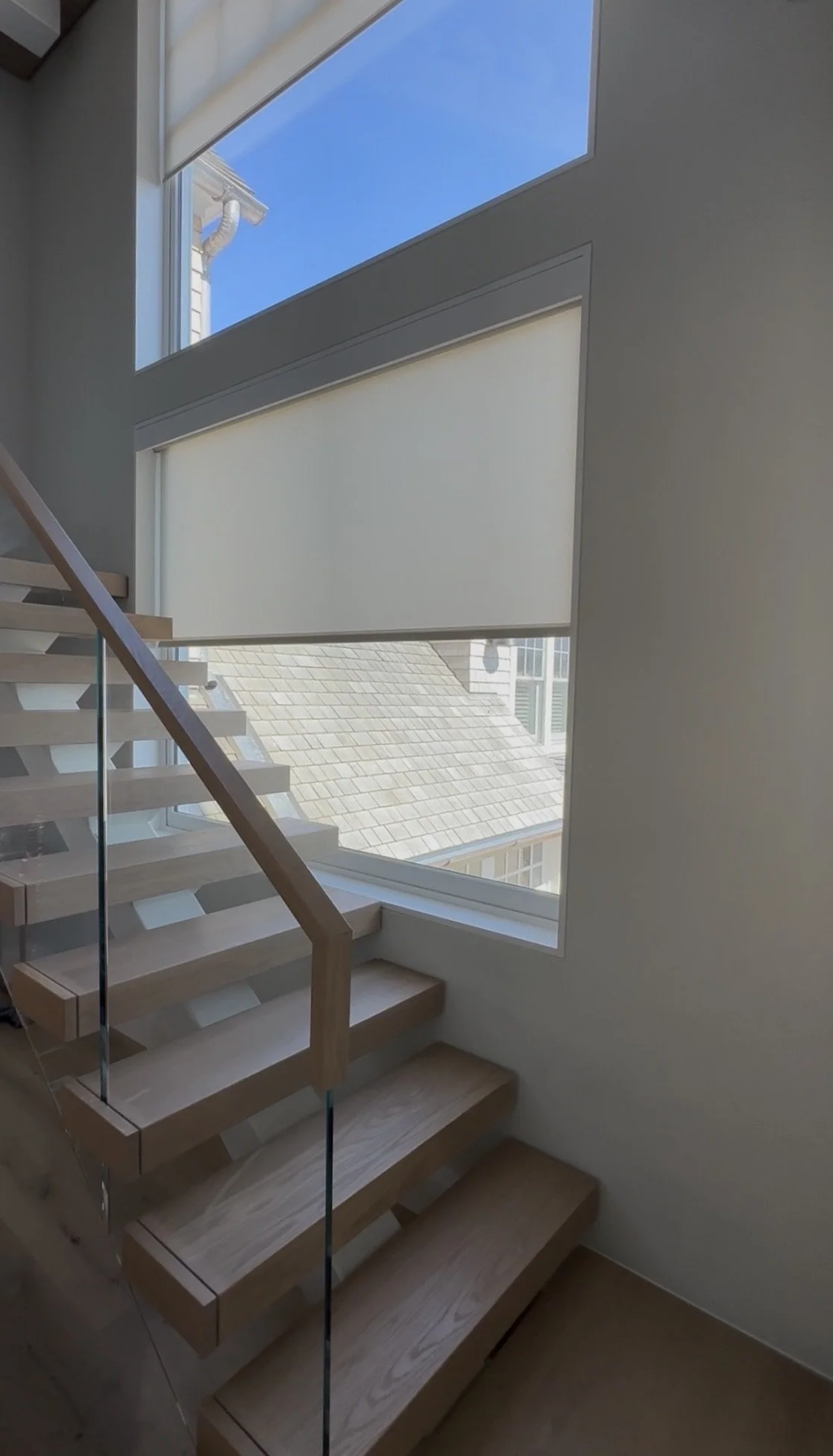 Lutron Shade Over Stairs.jpeg