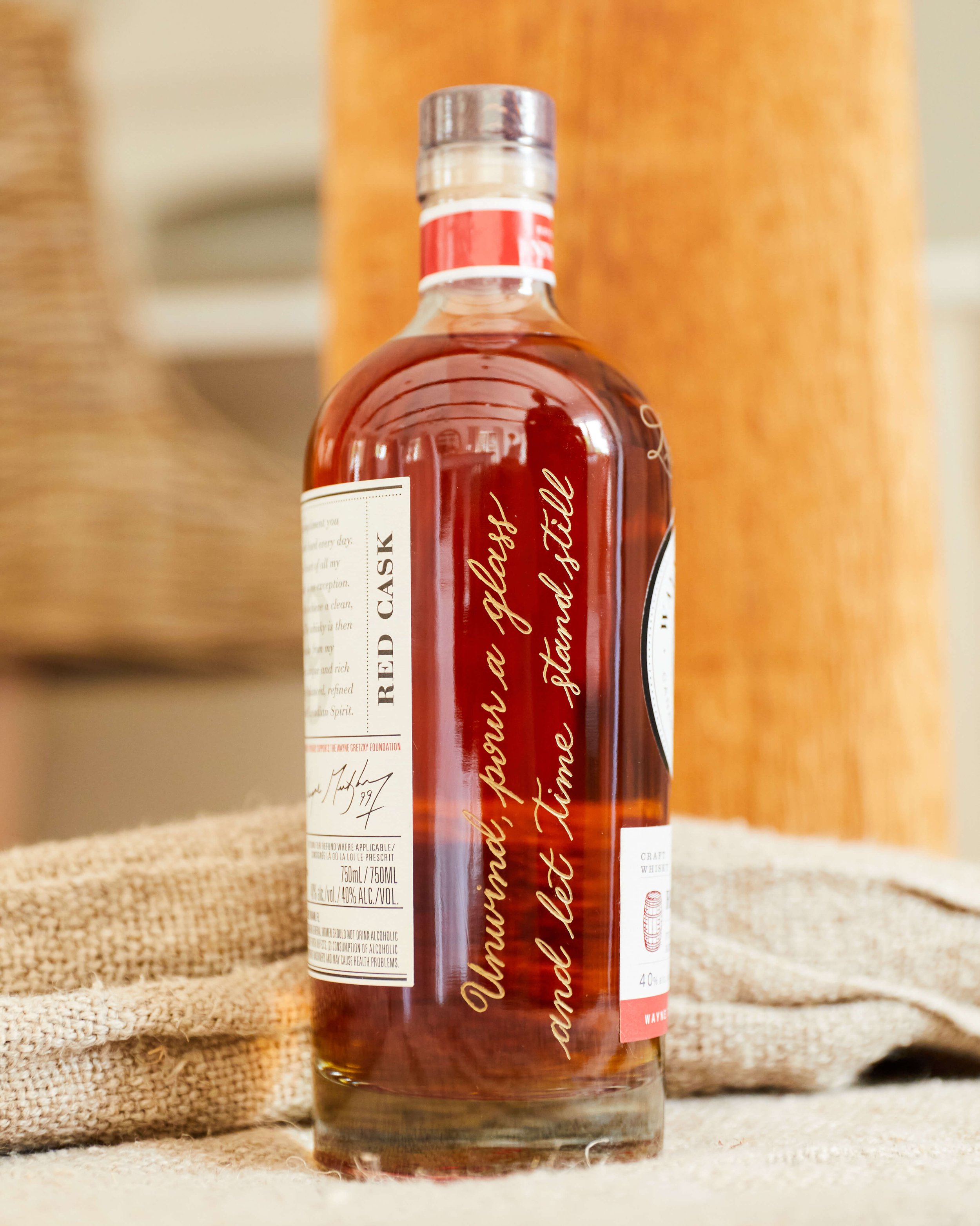 hand engraving on whiskey bottles-toronto hand engraver for live events and corporate gifting
