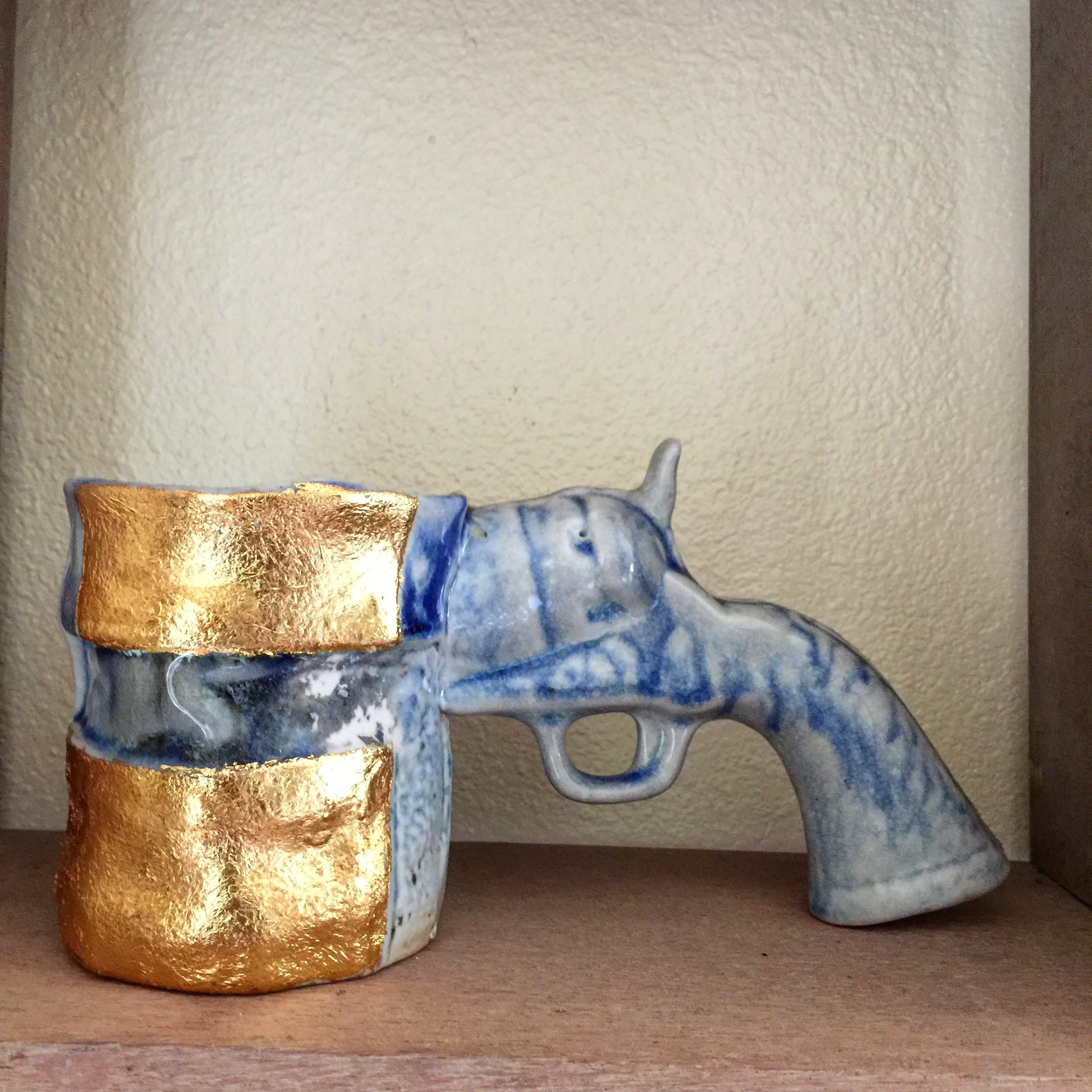 Soda Fired Guncup wioth Gold leaf.JPG
