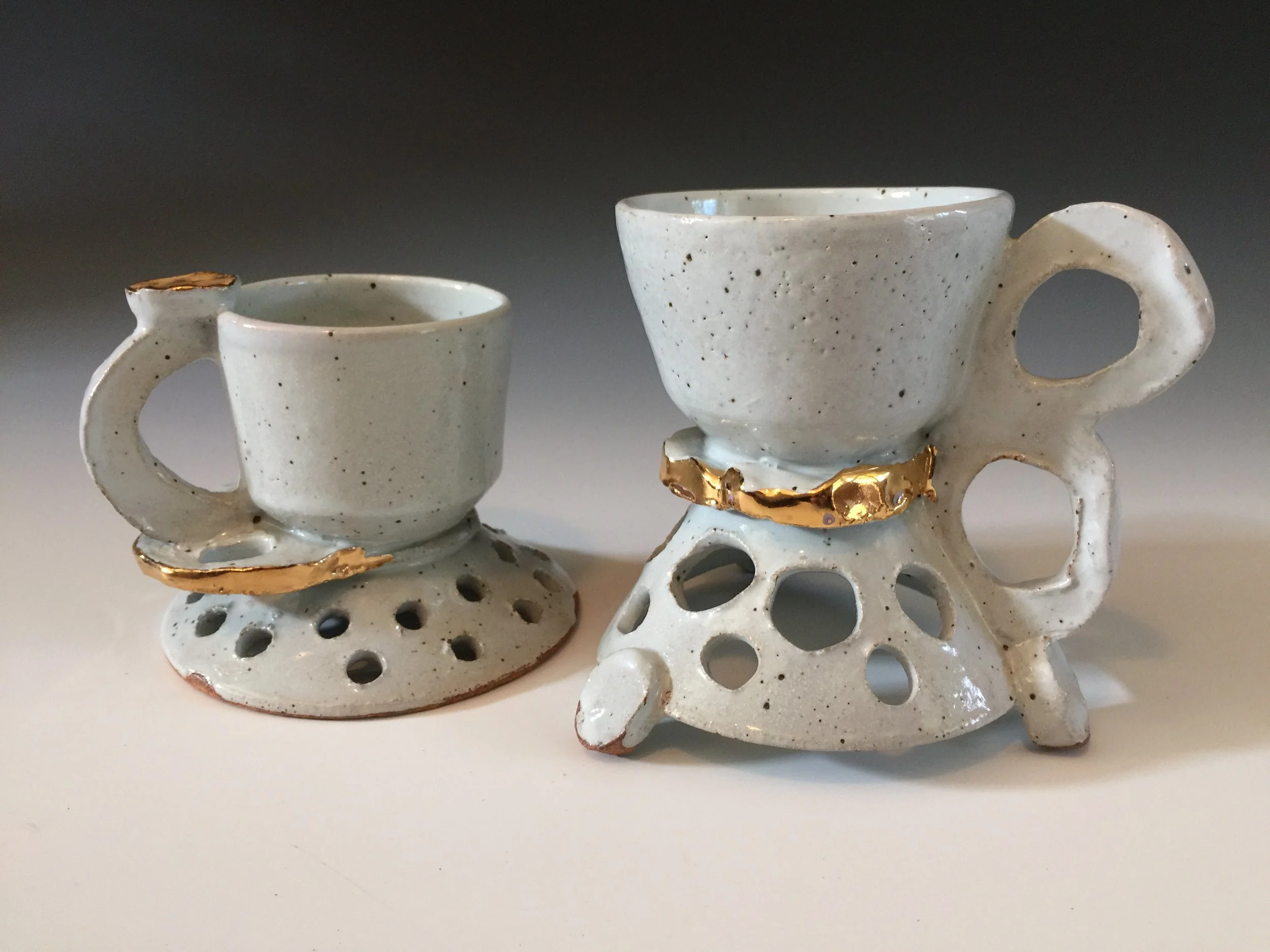 2 cups w_ holes and gold.JPG