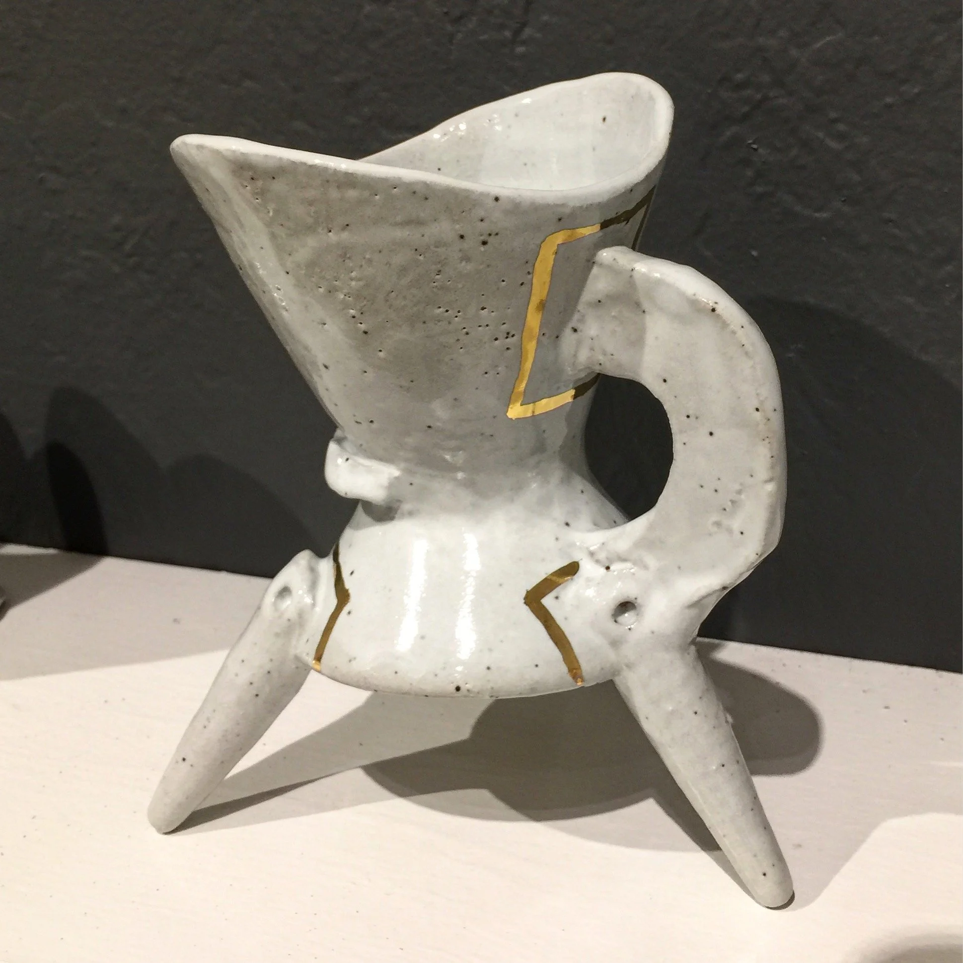 Tri leg in white w_ gold.JPG