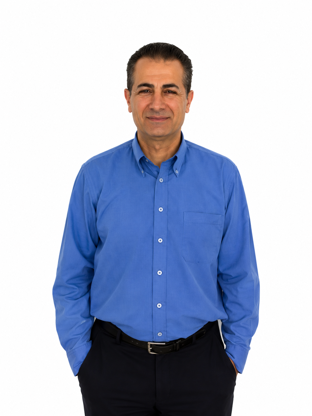 Man in blue shirt standing against white background