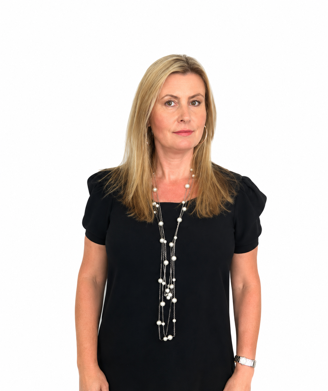 Woman in black dress with long necklace against white background