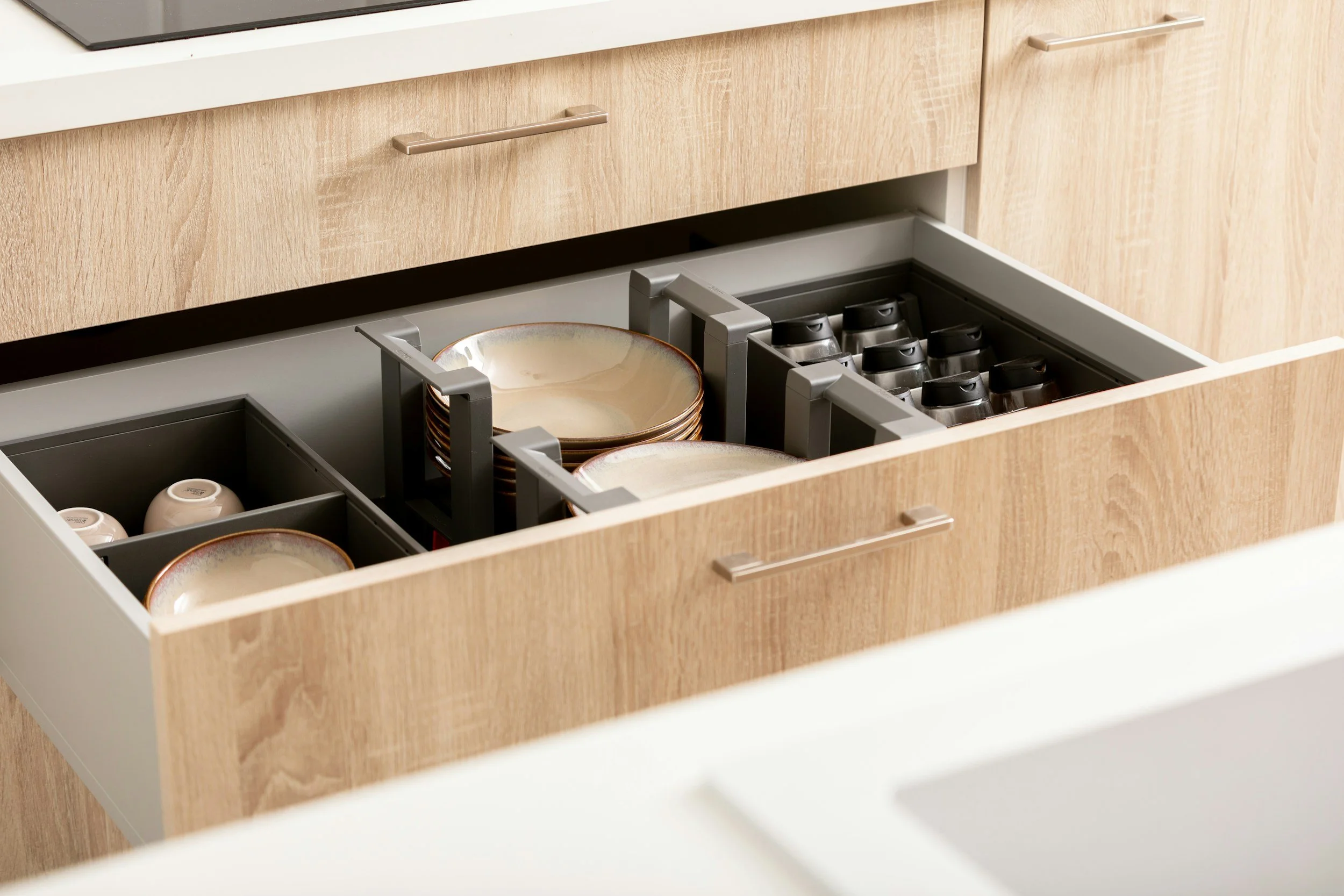 Cabinet Drawers vs. Roll-out Trays: Maximizing Your Kitchen Storage