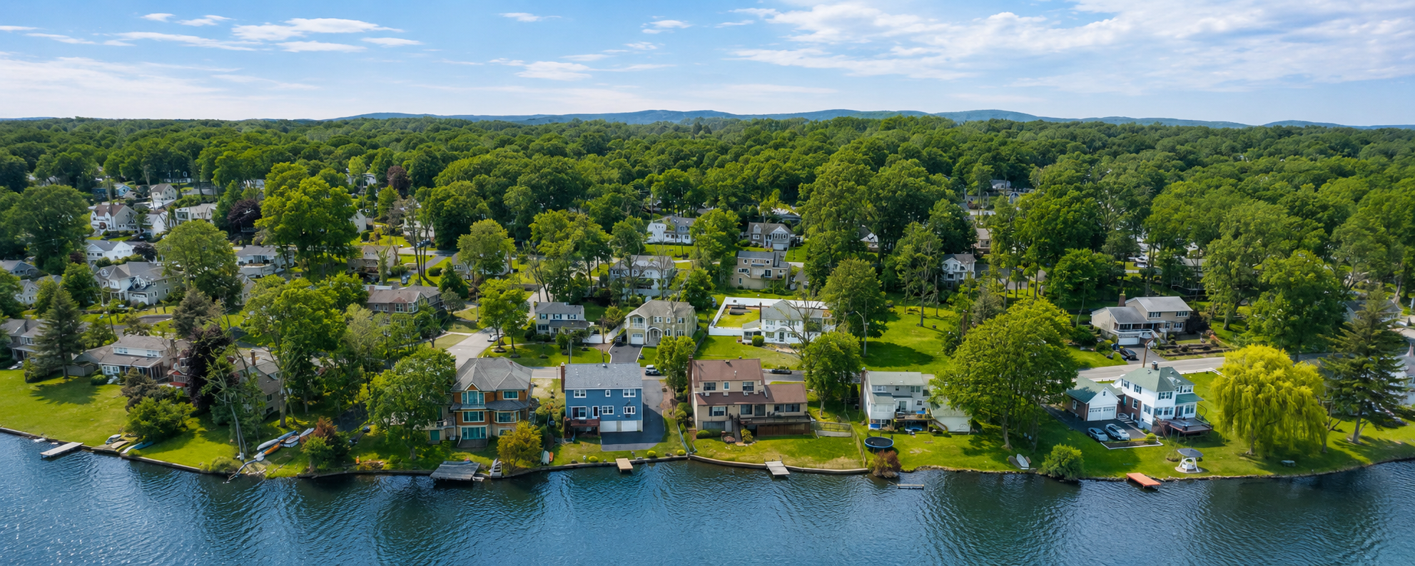 Aerial view of Packanack Lake and waterfront homes in Wayne, New Jersey.