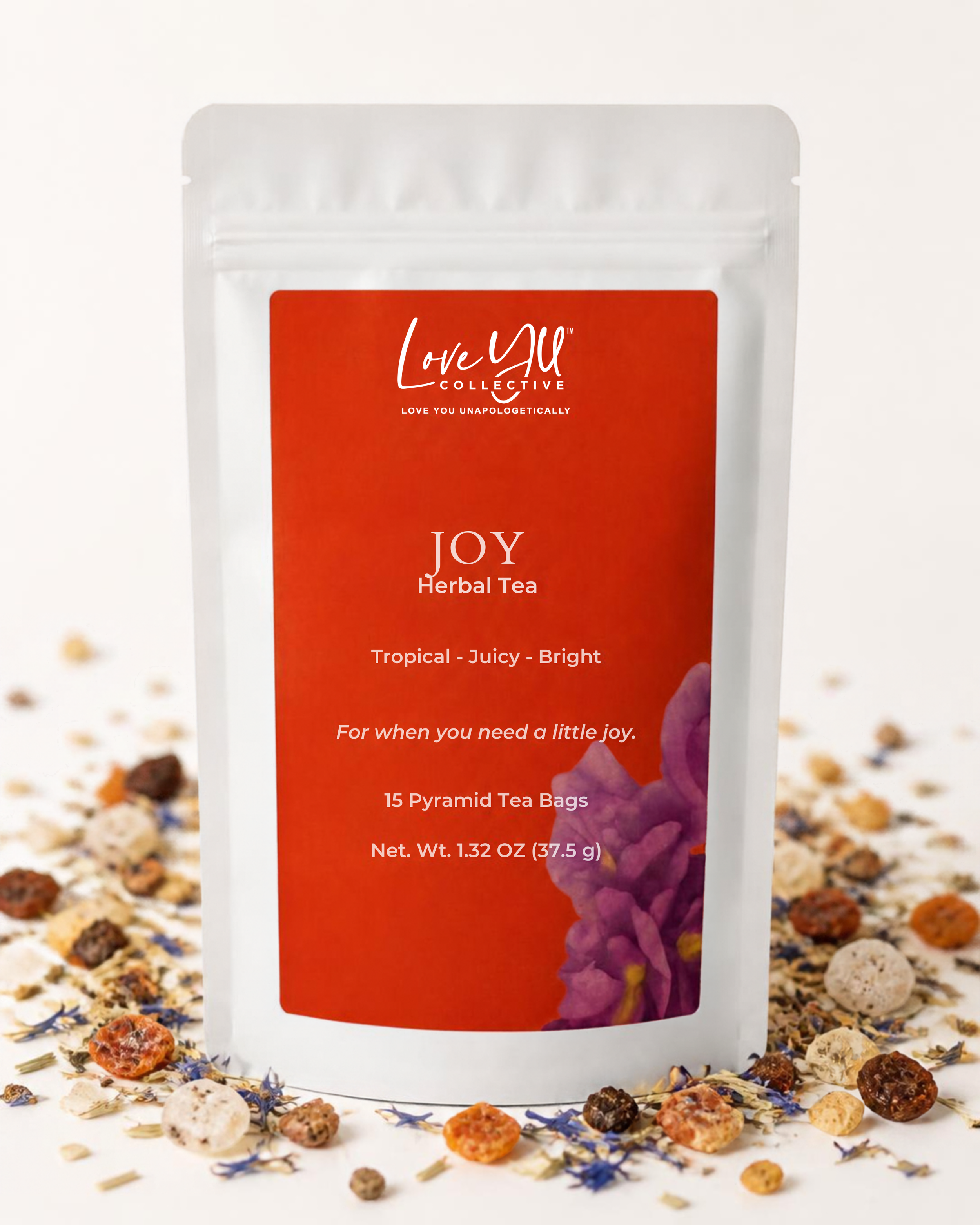 Joy tea blend with tea surrounding pouch.png
