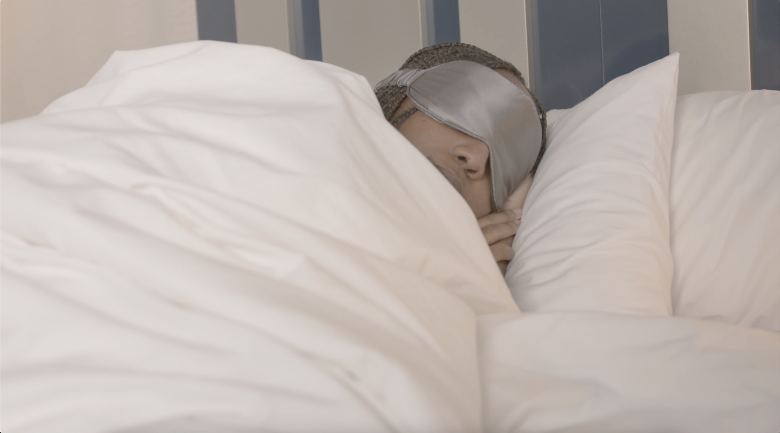 Young Black women sleeping with mask