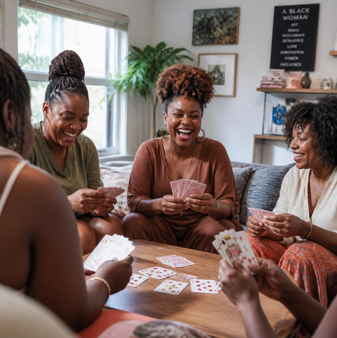 Several Black women enjoying themselves playing cards
