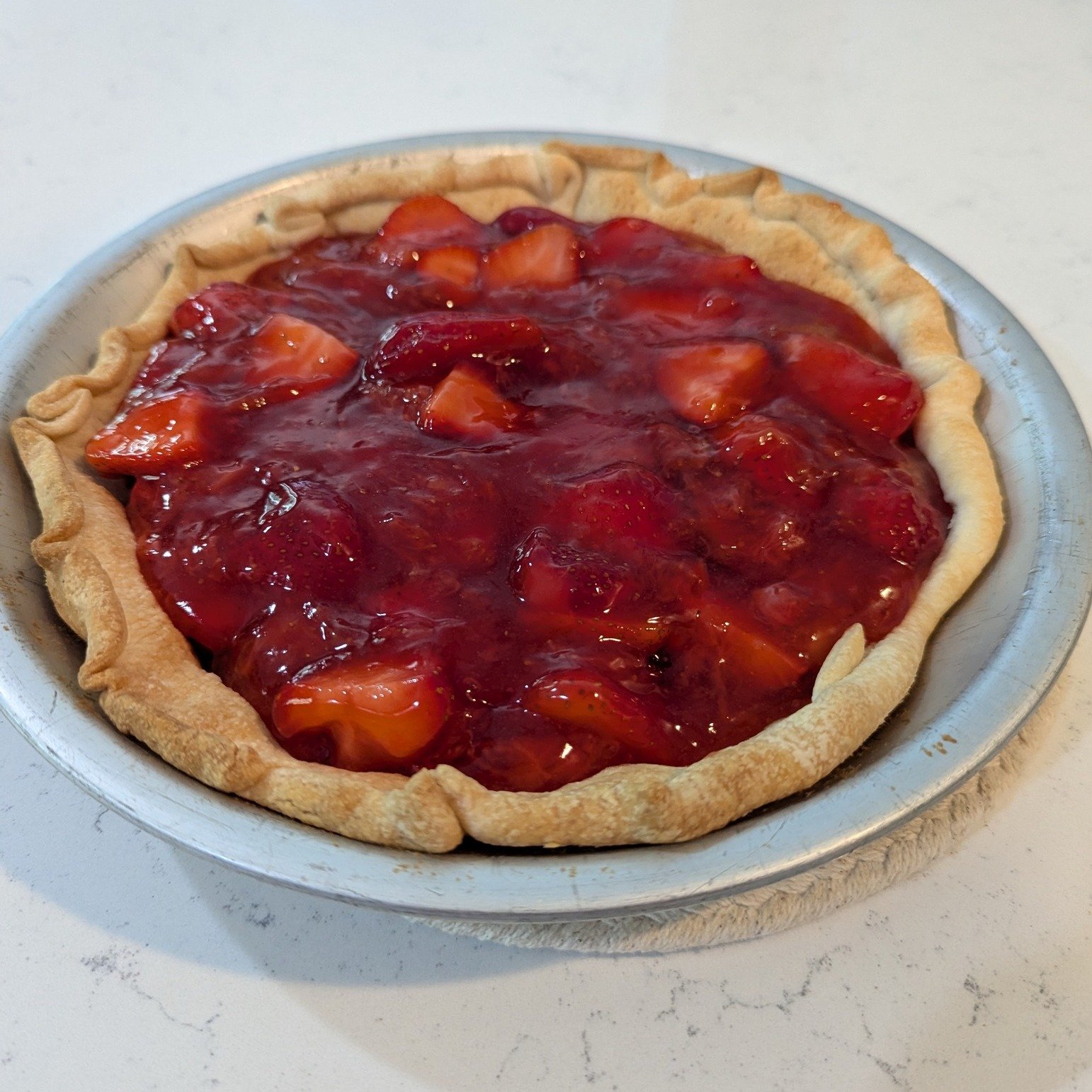 Highlight of my weekend so far: a homemade strawberry pie made with strawberries picked from my dad's place!