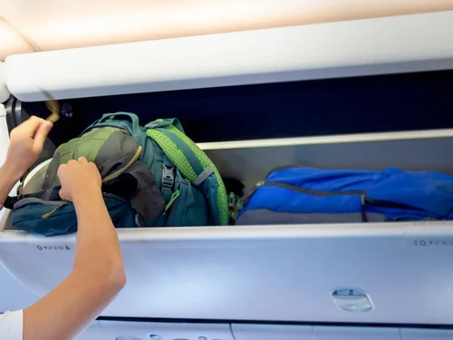 How to Put Carry on in Overhead Bin: Expert Tips for Easy Storage