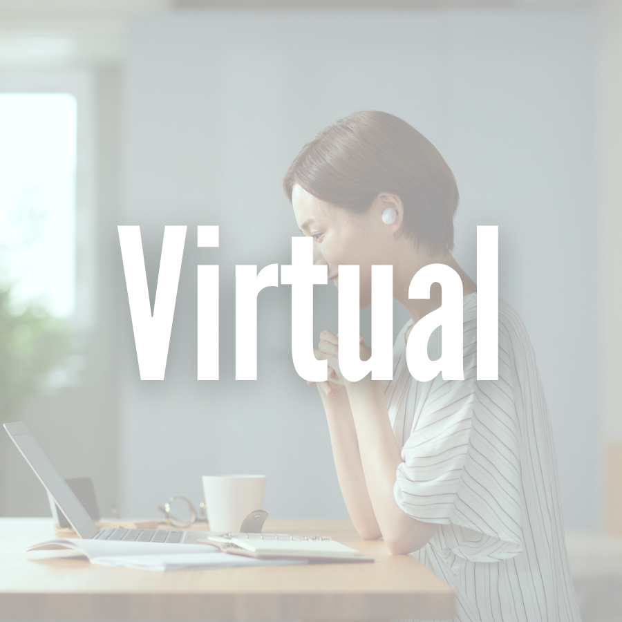 Woman sitting in front of laptop having a virtual consultation about services for her wig.