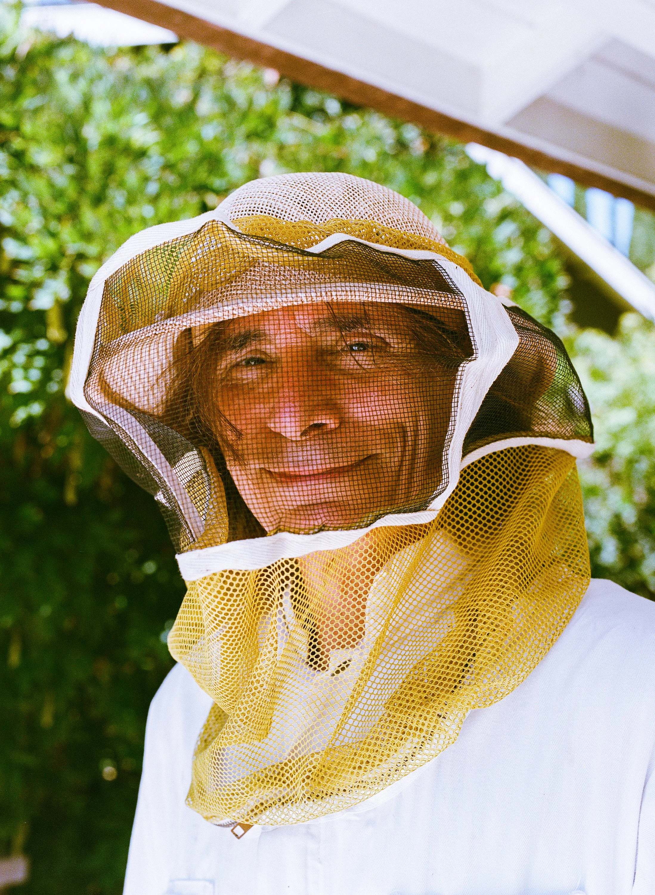 Steve Vai photographed beekeeping at his home in Los Angeles for CREEM Magazine, (2024, medium format film).