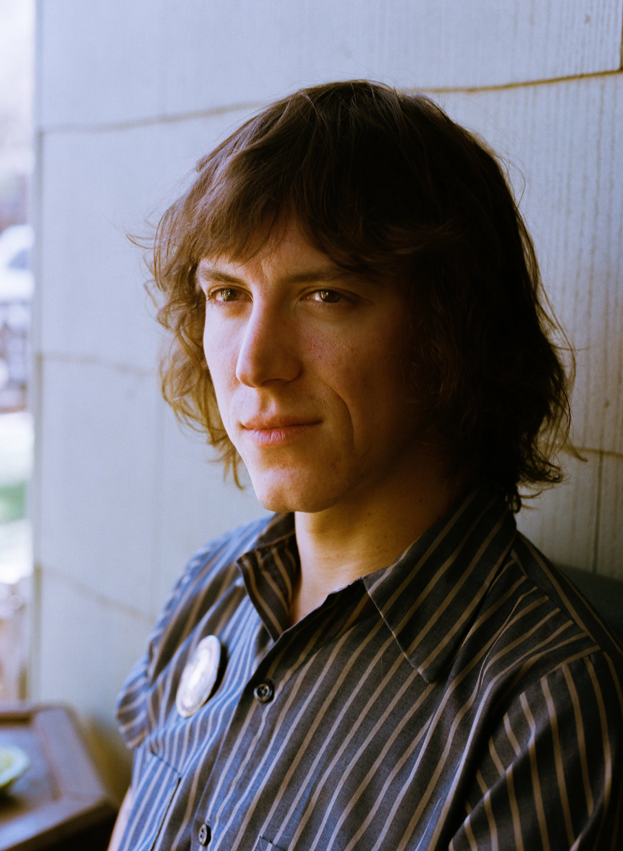 Gus Baldwin photographed at his home in Austin, TX (medium format film, 2024).