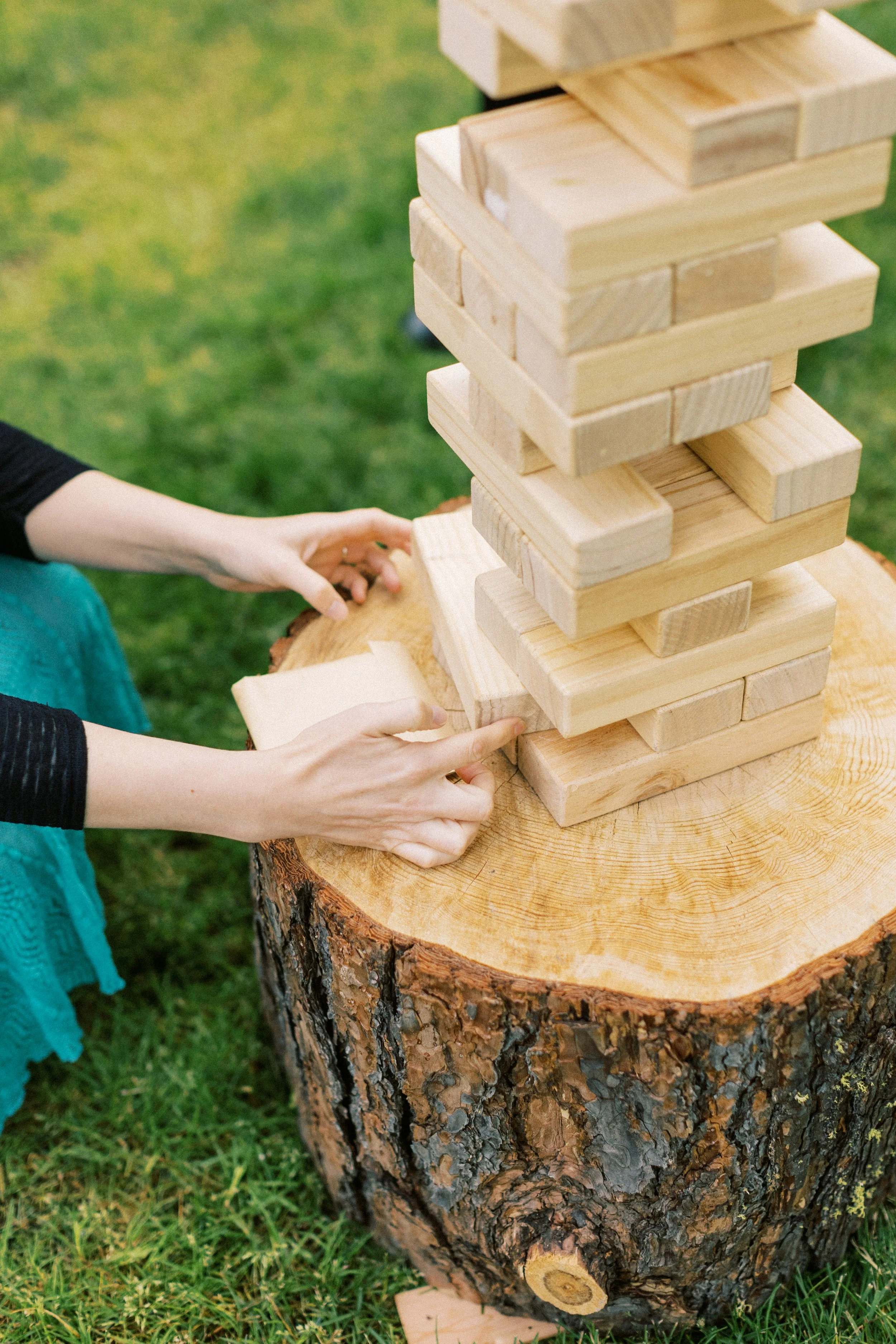 Giant Jenga lawn game rental at a Spokane wedding reception