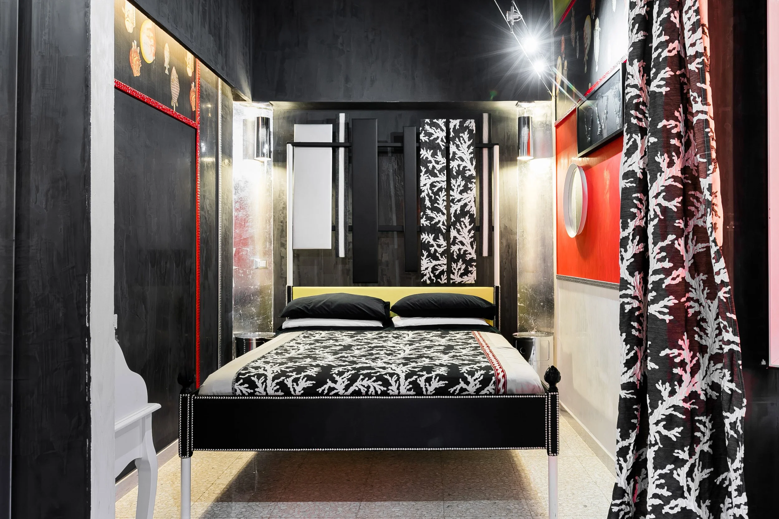 Bedroom of a modern apartment near the Colosseum in Rome