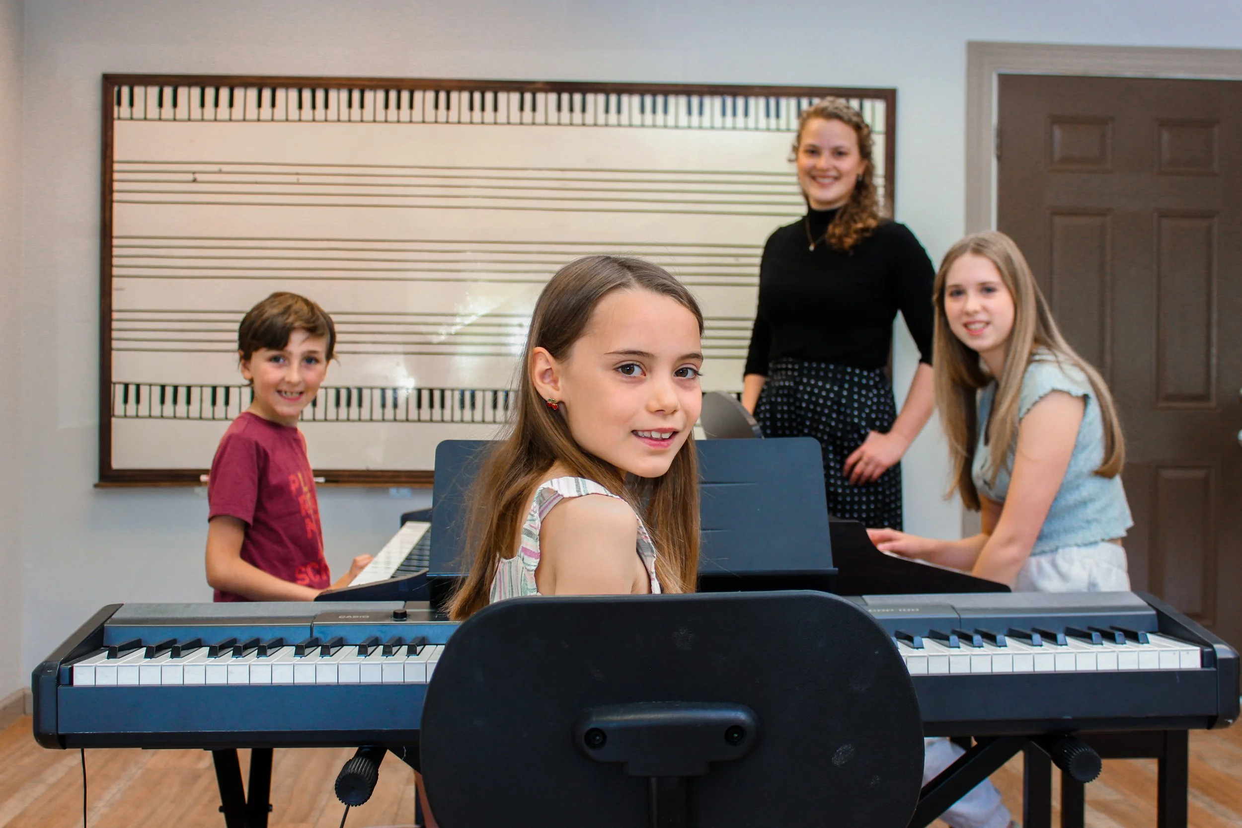 Group piano class #3 (posed + smiling).jpg
