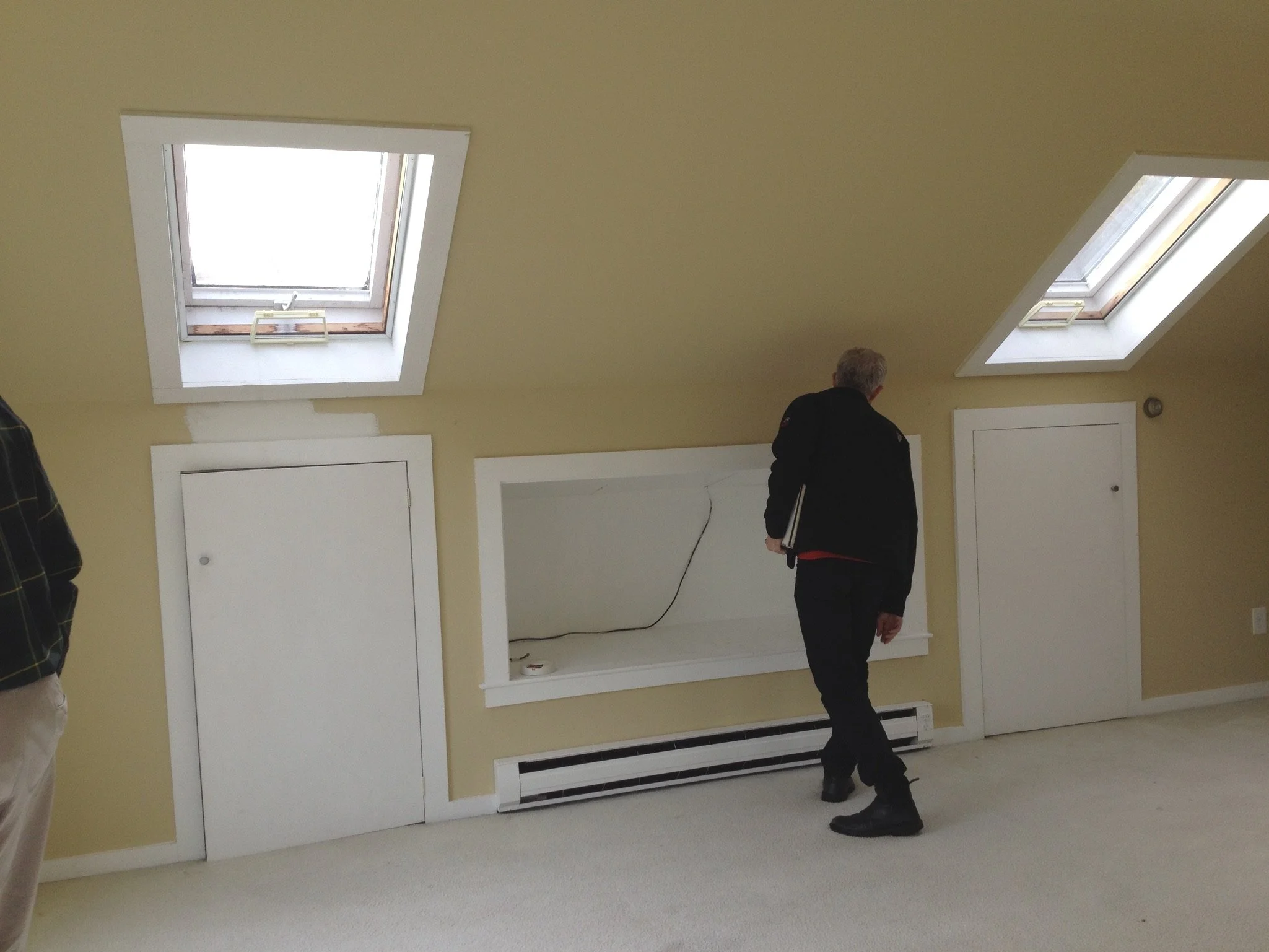 Sloped ceilings reduced usable space