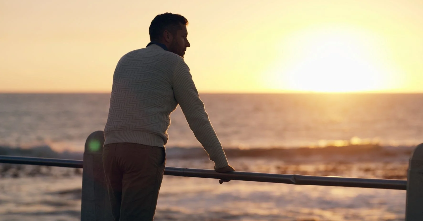 A gay man contemplating seeing an LGBT therapist
