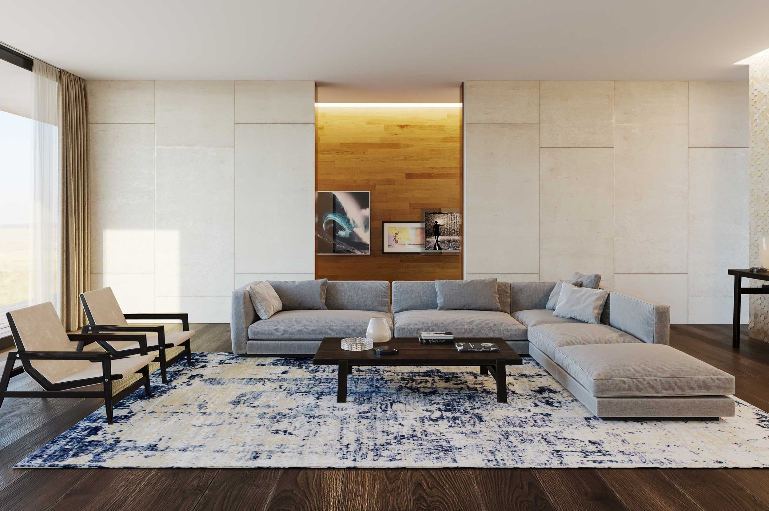 Modern living room with light gray L-shaped sofa, two beige armchairs with dark frames, a dark wood coffee table, and a blue and cream abstract rug. Wall art displayed on a wooden accent panel and a large window with beige curtains on the left.