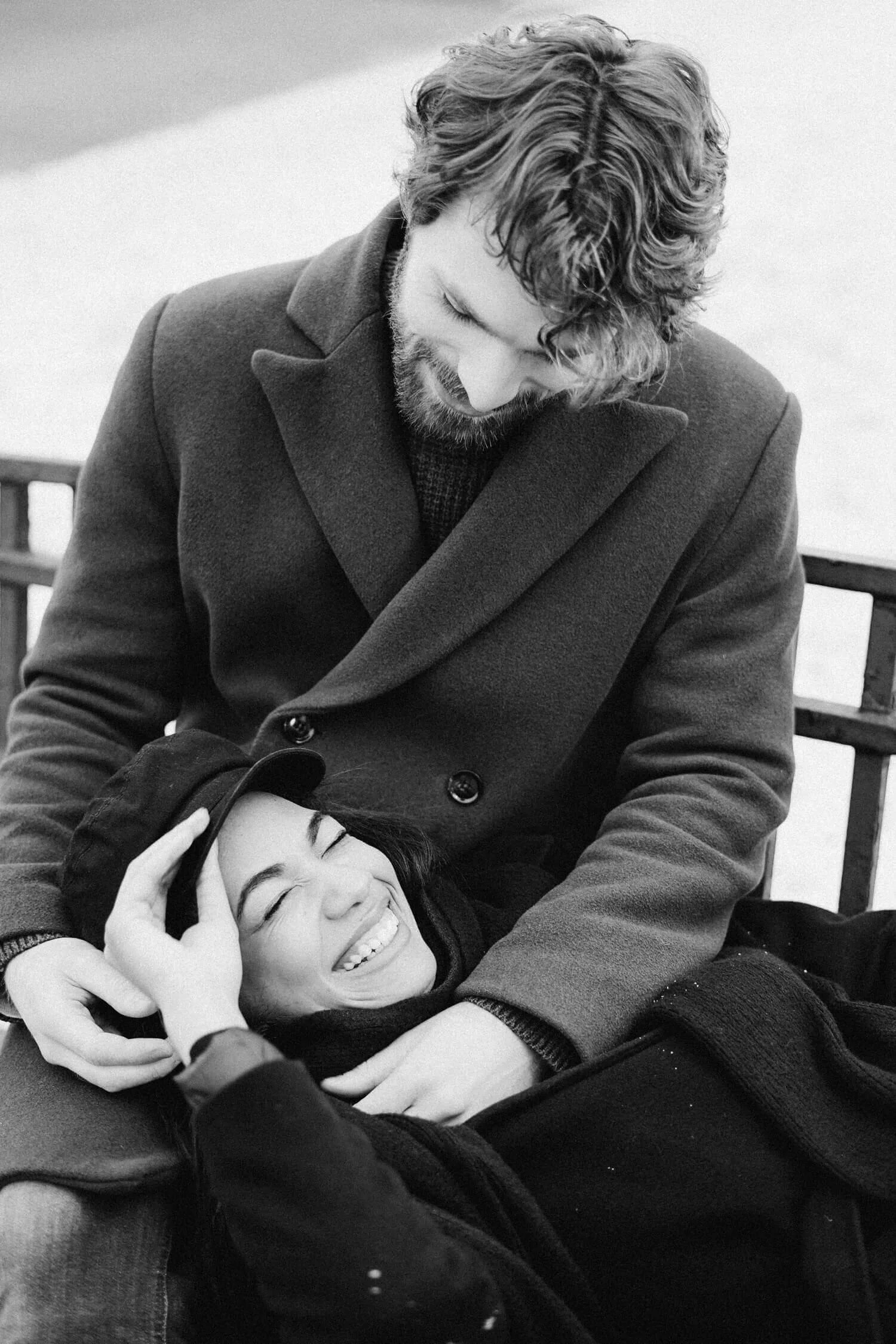 sm-monochrome-photo-of-woman-lying-on-man-s-lap-while-laughing-3692591-1.jpeg