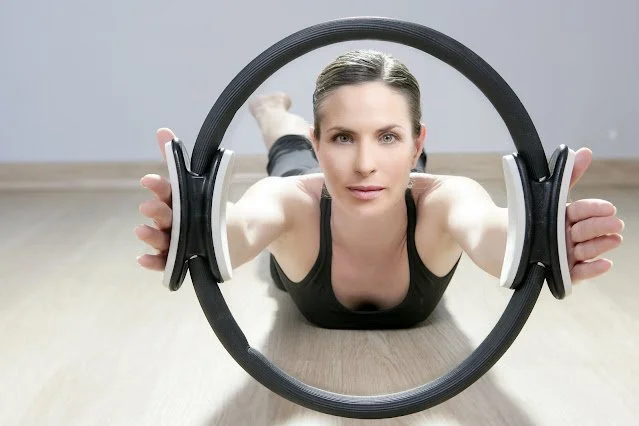 Exercising with the pilates circle