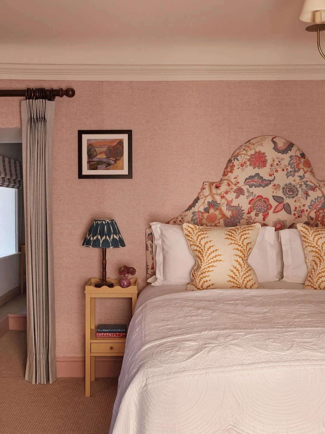 Suite 10, in the oldest part of the @alfristonsouthdowns hotel has views onto the croquet lawn and oodles of charm with the old windows and beams. We loved the vibrant colours and pattern of the headboard combined with the warm colours of this room. 