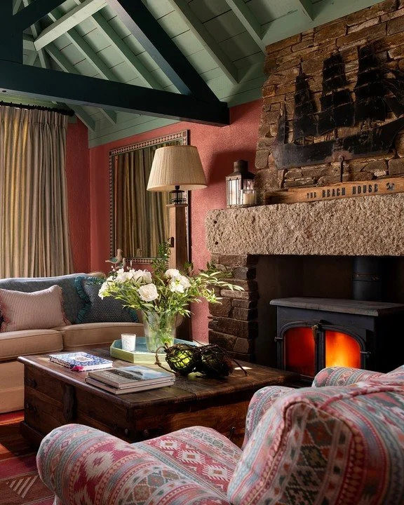 Looking back at a past project - this Cornish beach house is the most brilliant escape at any time of the year. The sitting room in particular is the best place to be snuggled up by the fire, looking out on to the big waves and wild weather outside ?