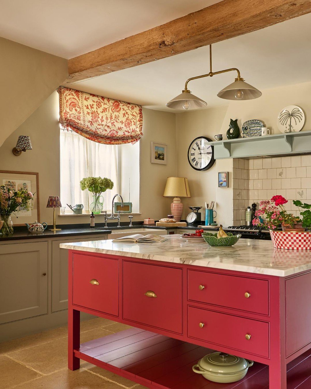 Our Cotswolds project farmhouse kitchen and butler's pantry - with cabinetry painted in a mix of crimson red and pale blues, and a combination of marble and darks tone worktops. This beautiful old house is full of history, and we loved working with i