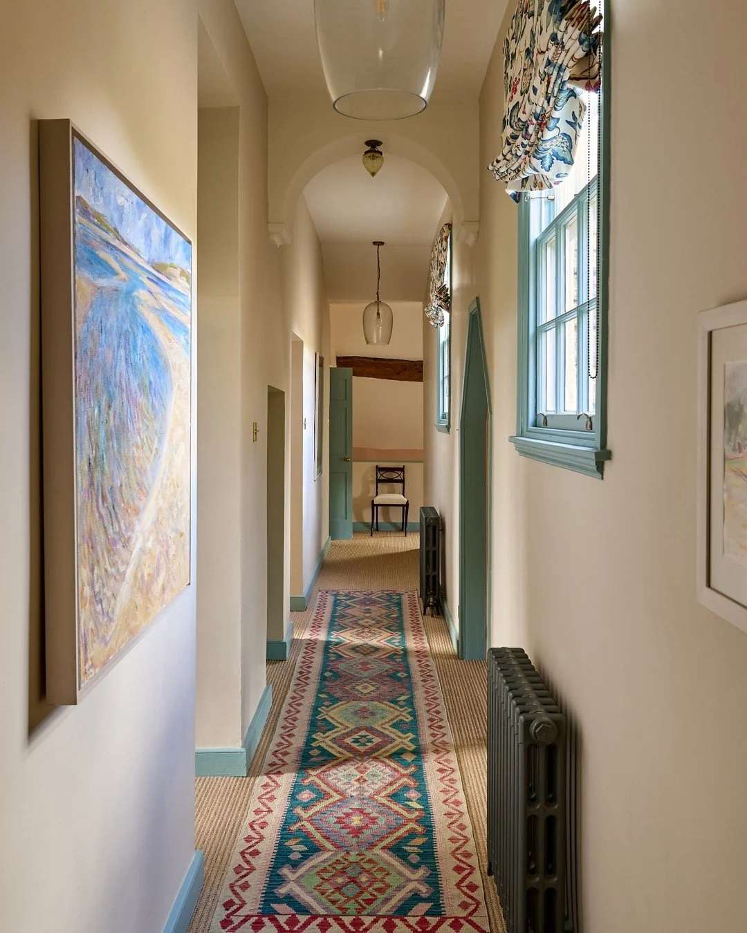Upstairs landing and stairway in our Cotswolds project 💙
GWD treatment complete - warm neutral walls, beautiful blue woodwork carried through the blinds, artwork and rug, plus mirrors and elegant glass lighting to bounce natural light around the spa