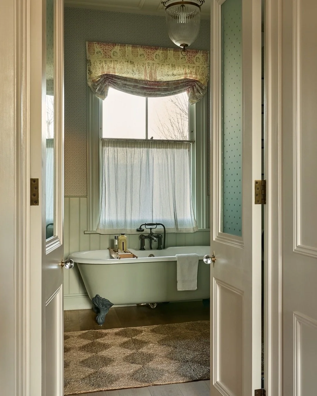 The view into the master ensuite of our London townhouse project. We opted for wallpaper and half panelling in this room for maximum warmth... and of course we love a bath tub under a window! 
⠀⠀⠀⠀⠀⠀⠀⠀⠀
Photos @mikegarlickdesign
⠀⠀⠀⠀⠀⠀⠀⠀⠀
-
⠀⠀⠀⠀⠀⠀⠀⠀⠀