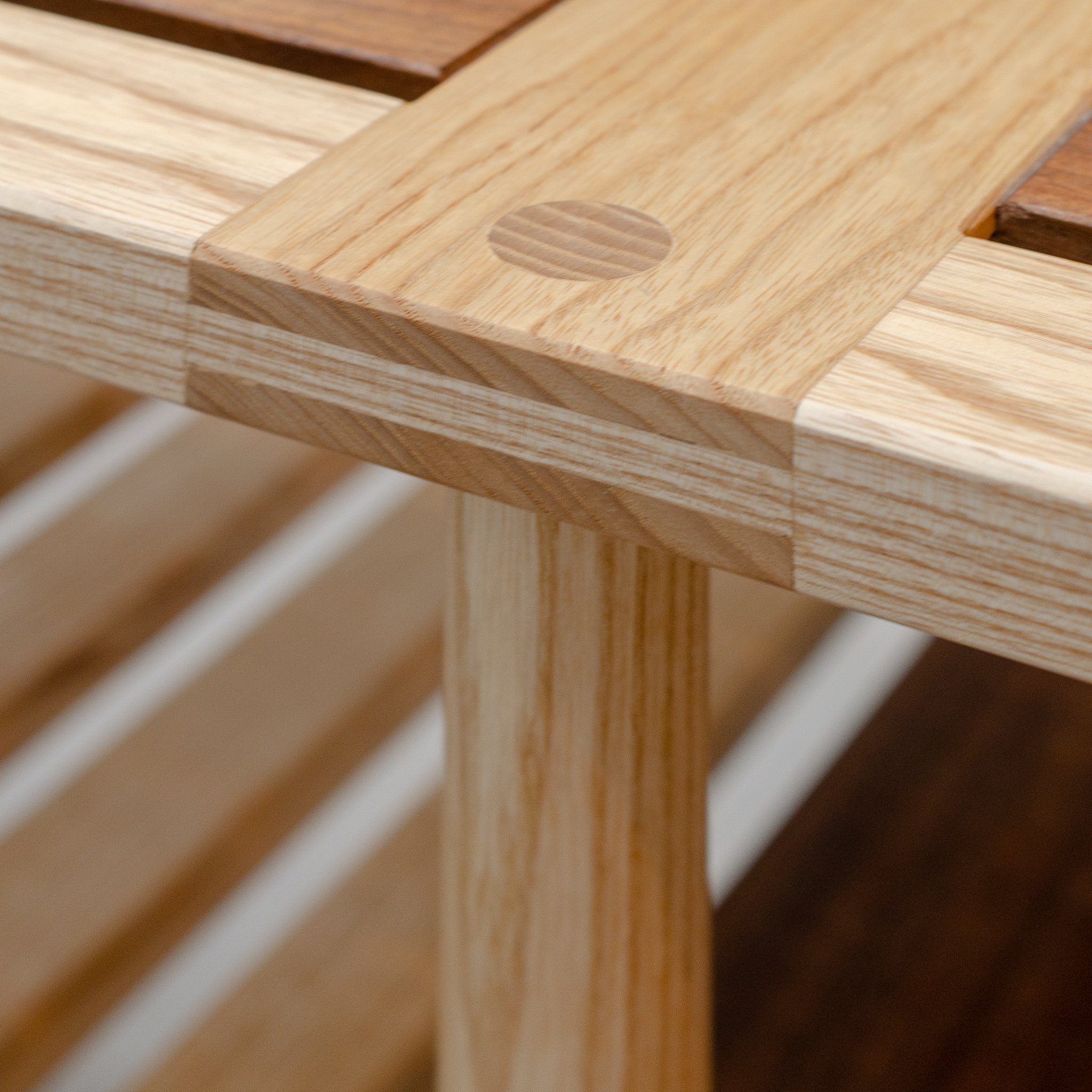 Joinery detail from a hallway bench in ash