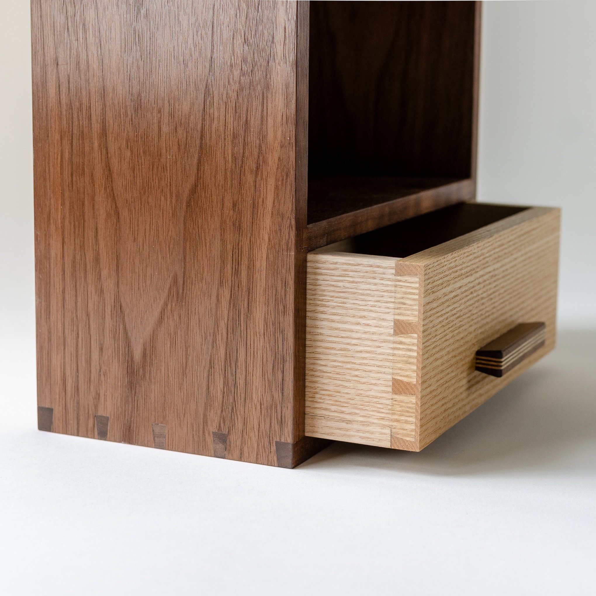 Hallway cabinet with handcut dovetail joinery in ash and walnut