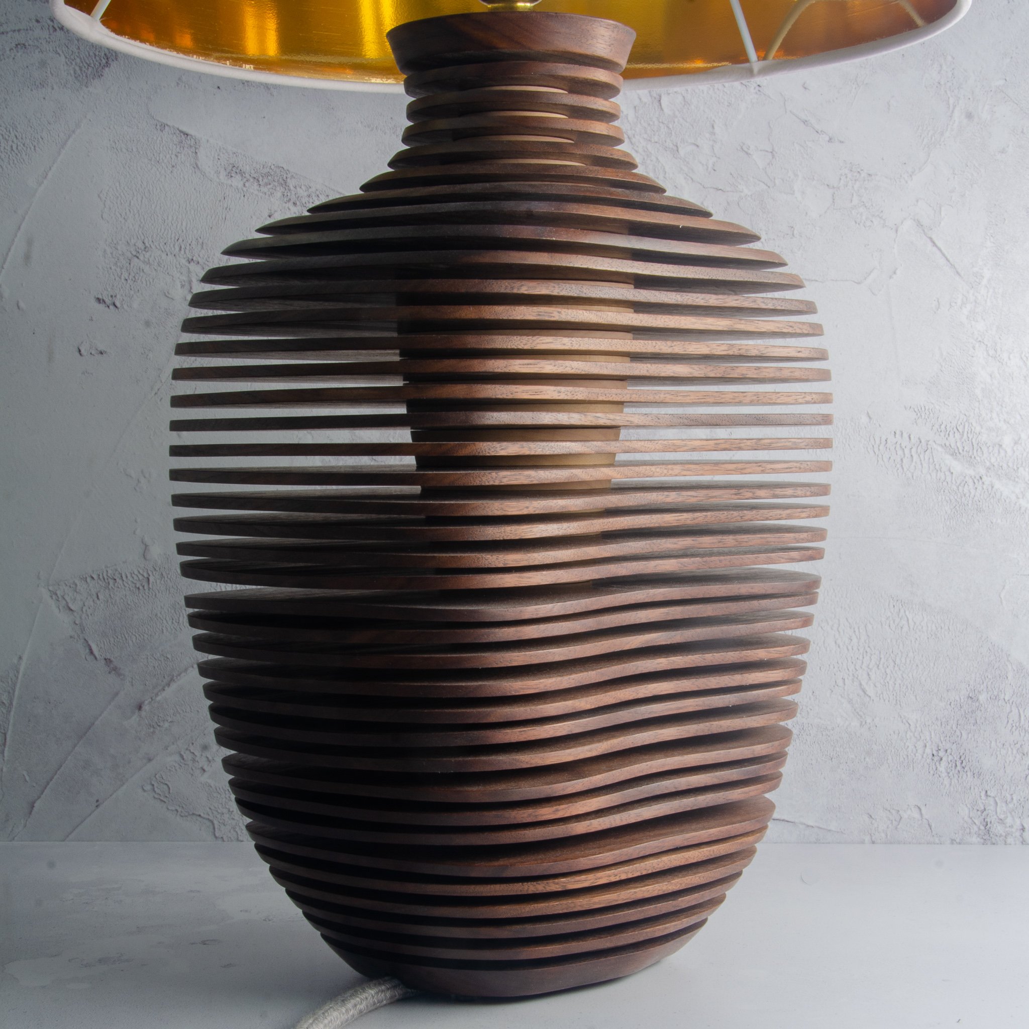 Sculptural lamp in walnut and sycamore