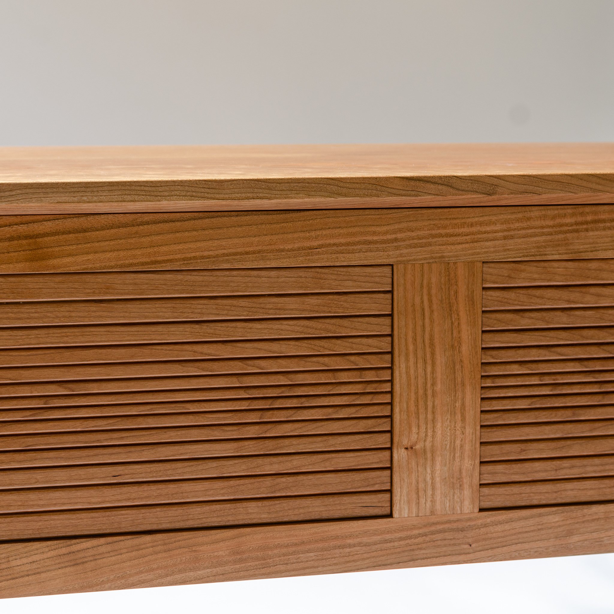 Hallway chest in cherry with reeded panels