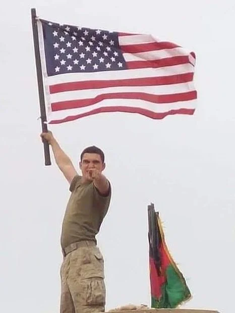 Lance Corporal Eugene C. Mills III &mdash; &ldquo;Gene&rdquo; to family, &ldquo;Gino&rdquo; to his brothers in arms &mdash; grew up in Laurel, MD. 

After 9/11, at just 17, he chose to serve his country and became a proud U.S. Marine.
He deployed twi