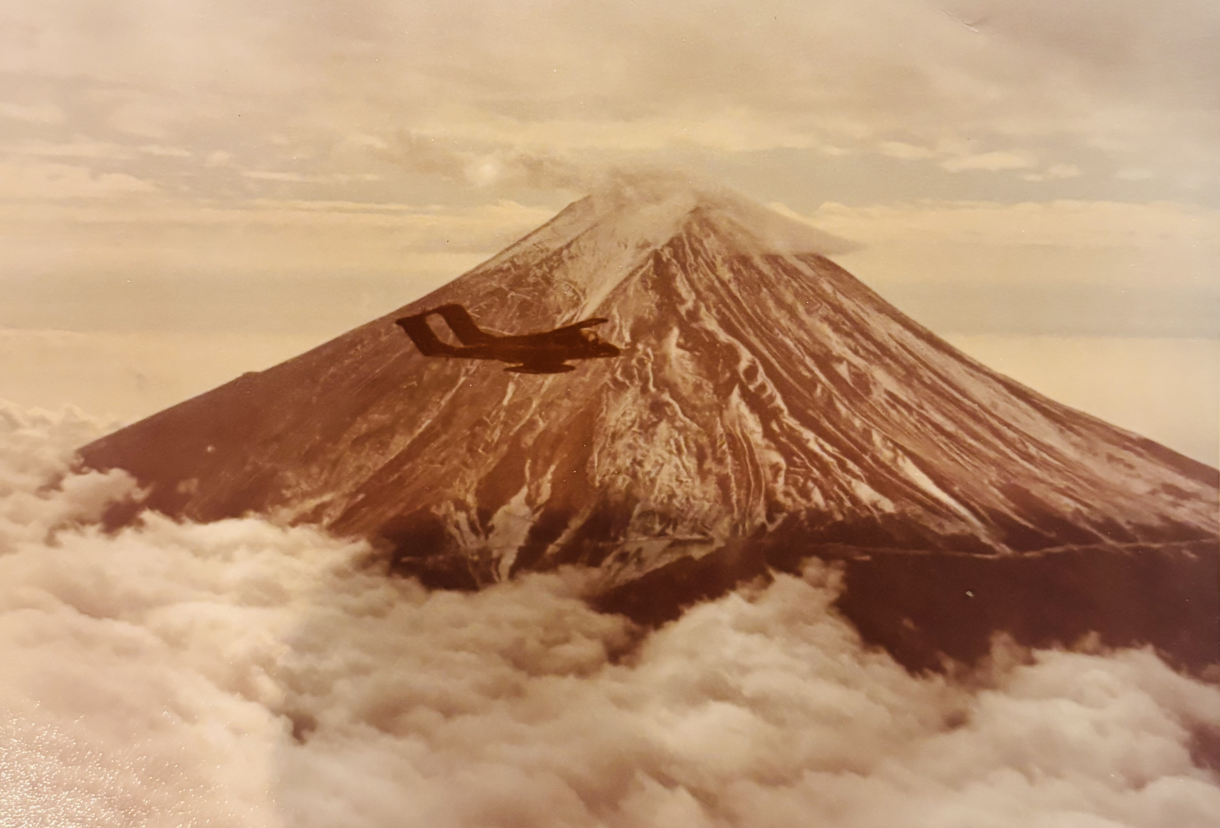 Ov-10 Bronco flying near Mt. Fuji.
