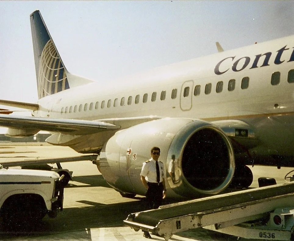Me standing beside a Continental B-737 300.