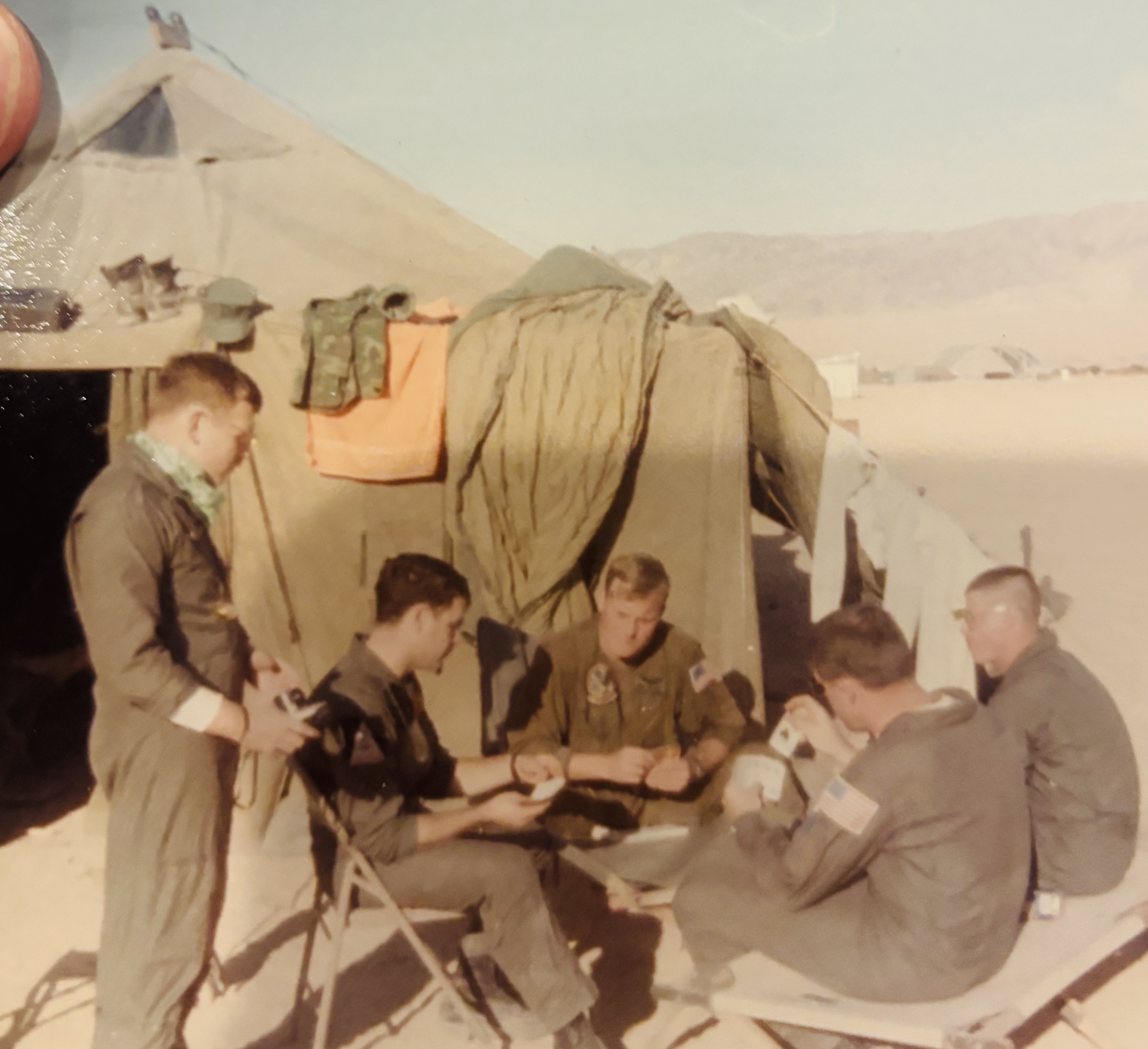 Somewhere in the desert playing Spades. Probably 29 Palms, CA. We called it Twenty-nine Stumps.