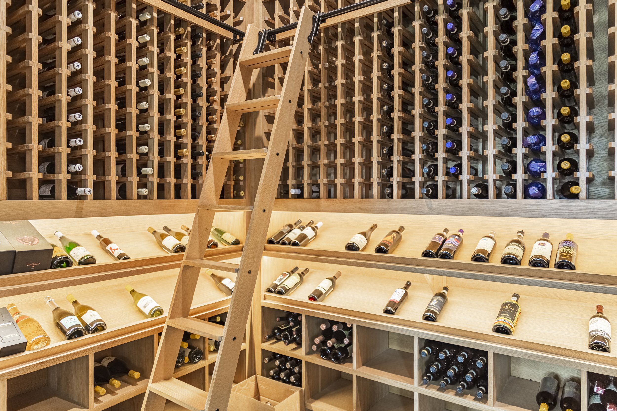 Rift Cut White Oak Custom Wine Room; Sliding Ladder